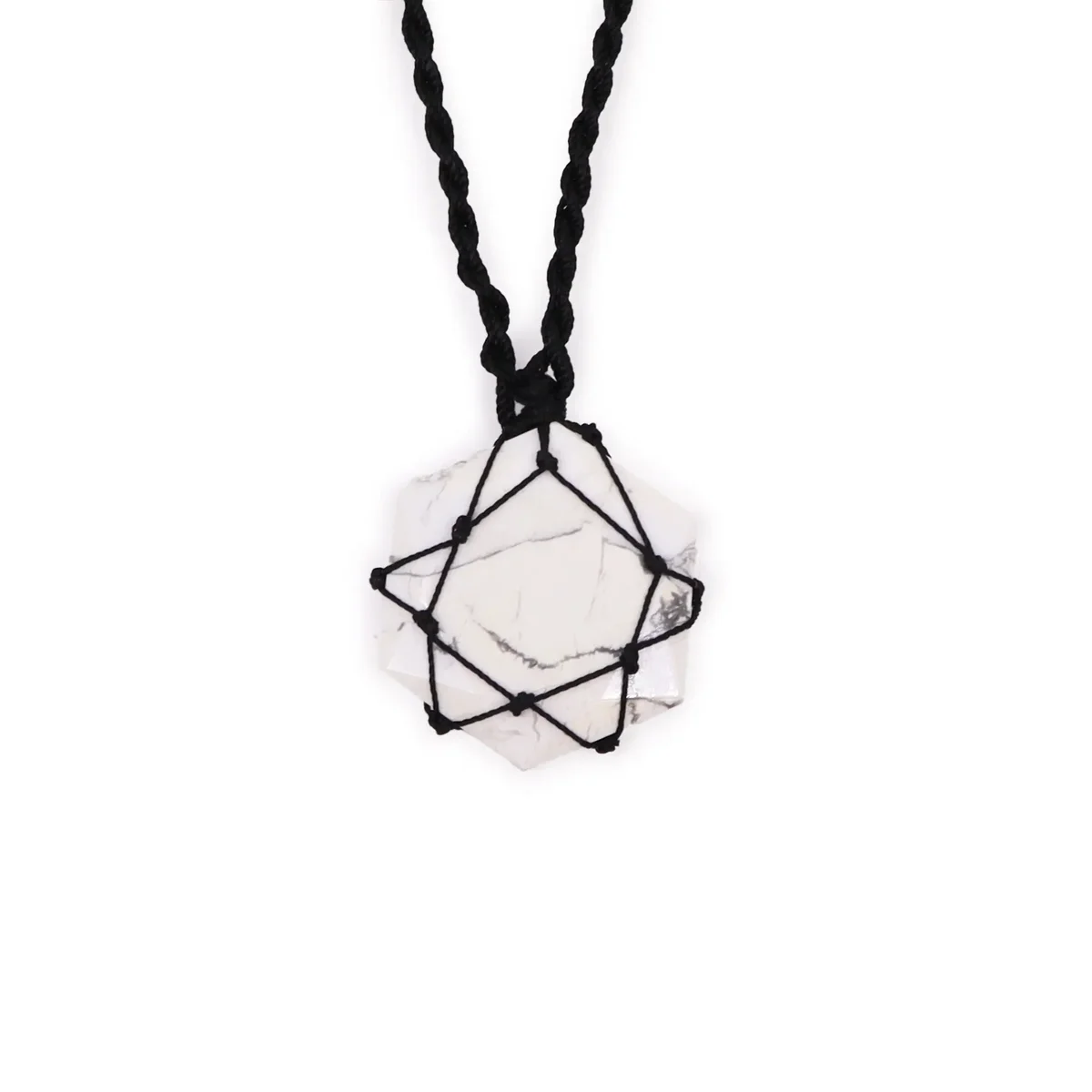 White Howlite hexagon gemstone pendant with laced detailing on a silver chain against a white background