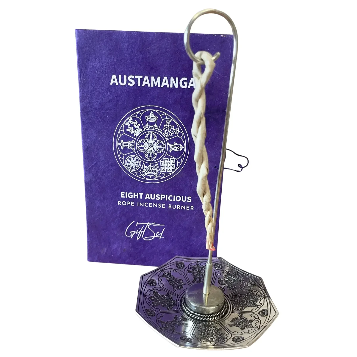 Silver plated incense holder with rope incense sticks arranged on a white background from Astamangal set