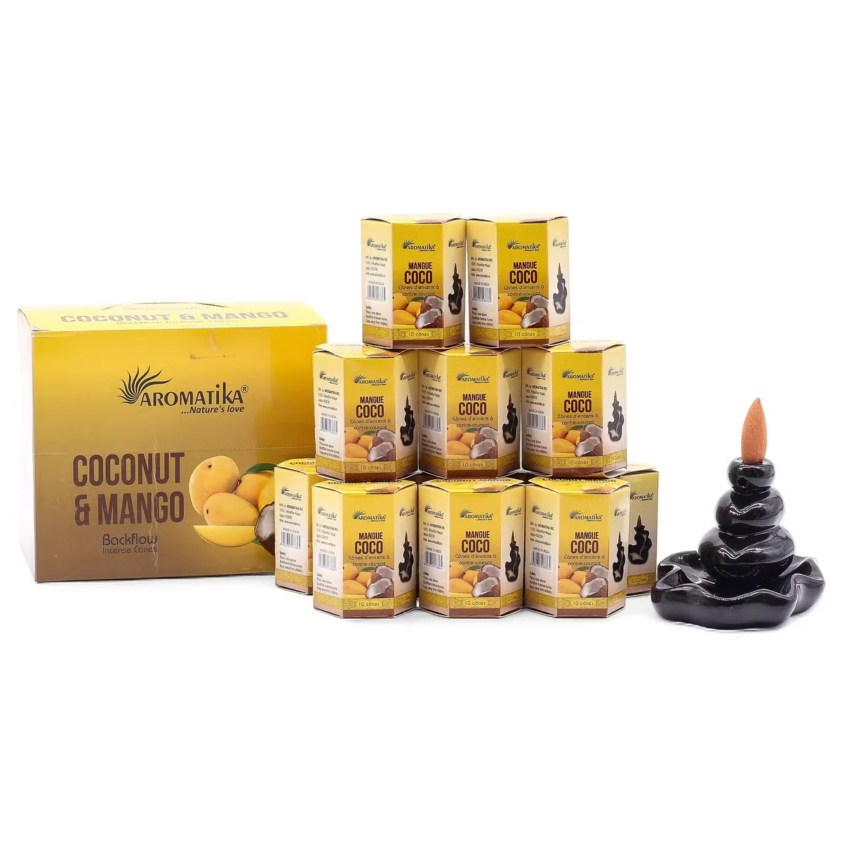 Pack of 10 incense cones with coconut and mango scent arranged on a wooden surface with decorative elements