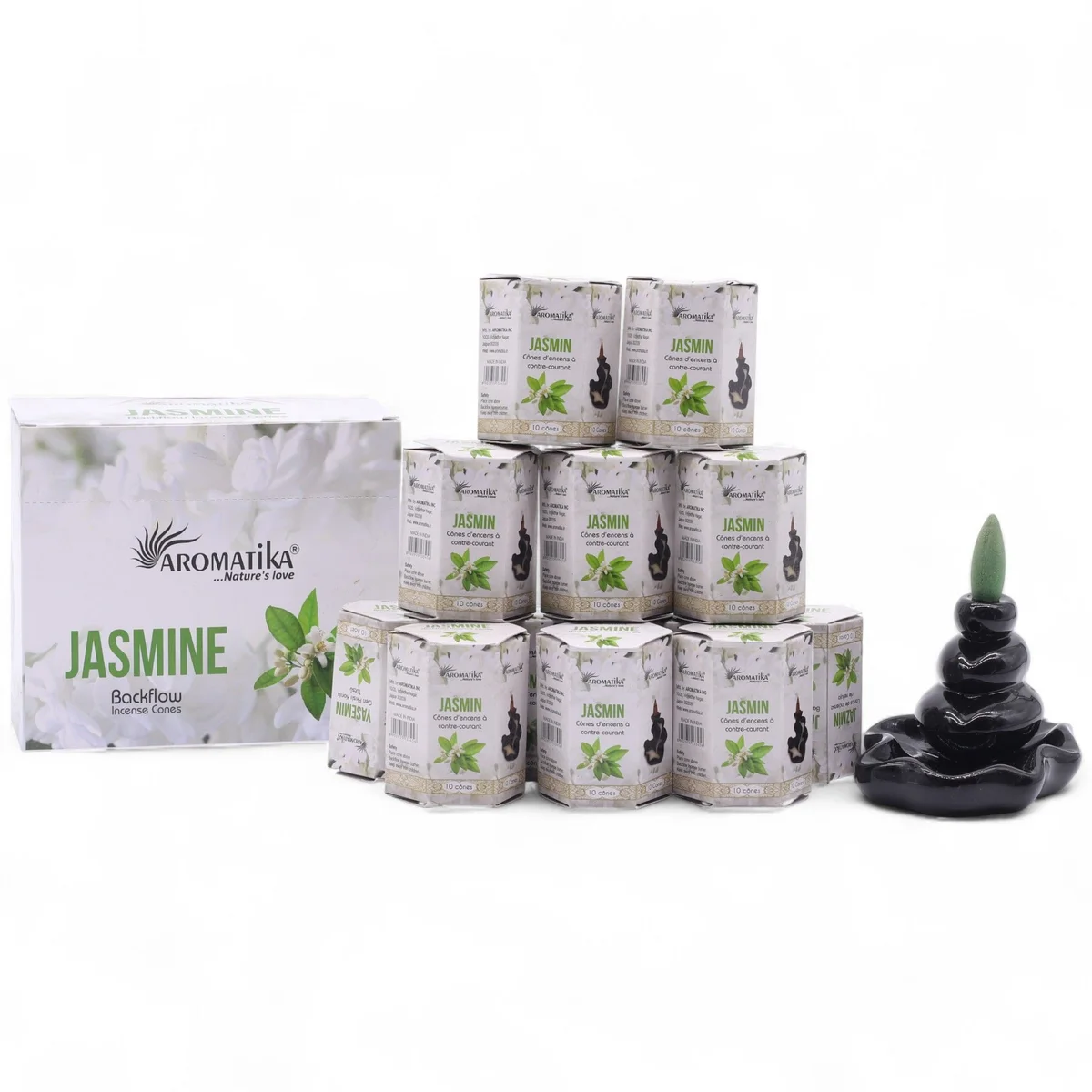 Pack of 10 jasmine-scented masala backflow incense cones arranged on a wooden surface with smoke flowing downwards