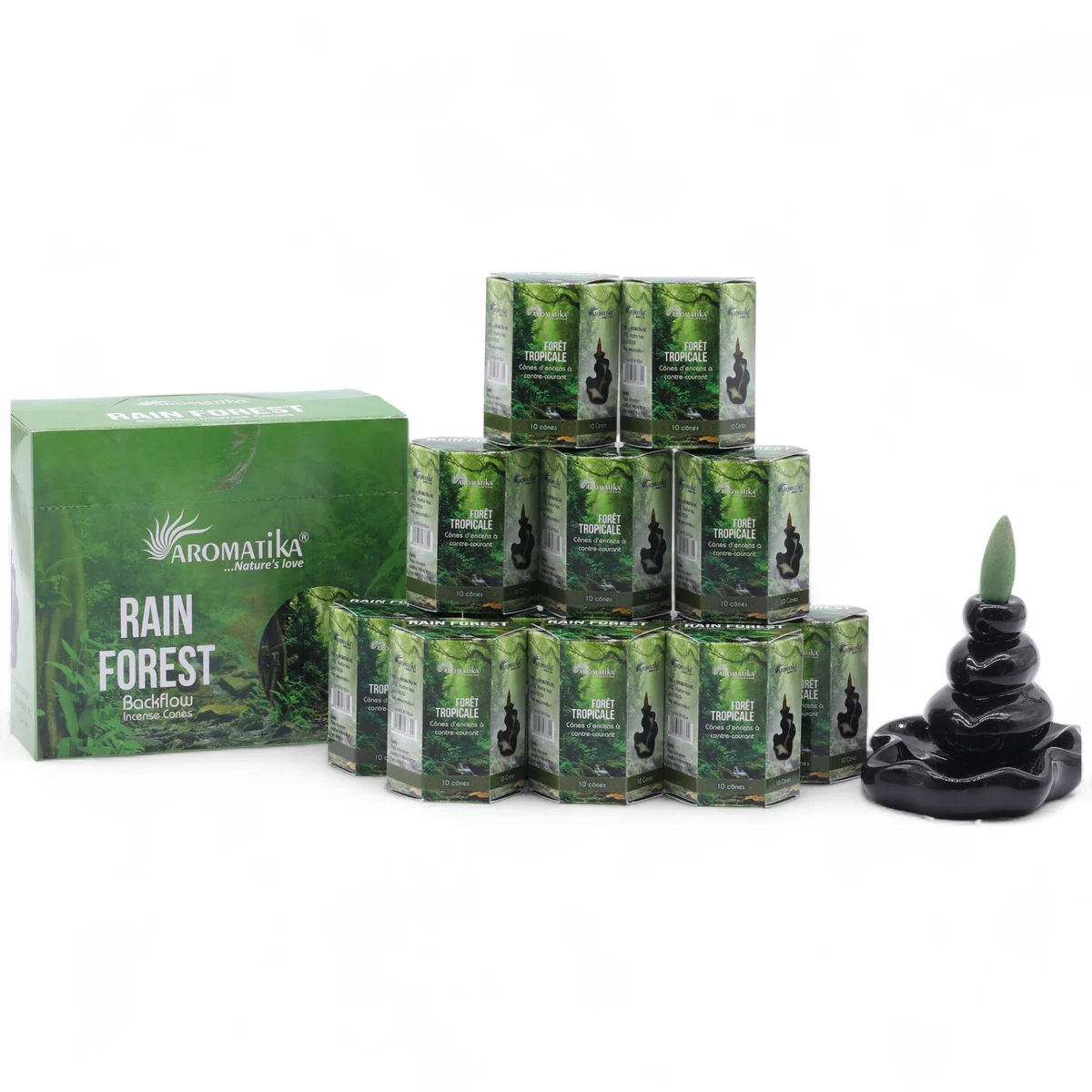 Pack of 10 Rain Forest masala backflow incense cones arranged on a wooden tray with smoke flowing downwards