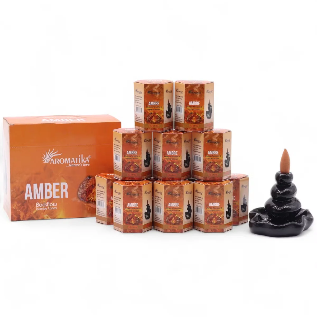 Pack of 10 amber masala incense sticks arranged with smoke flowing from backflow cones on a white background