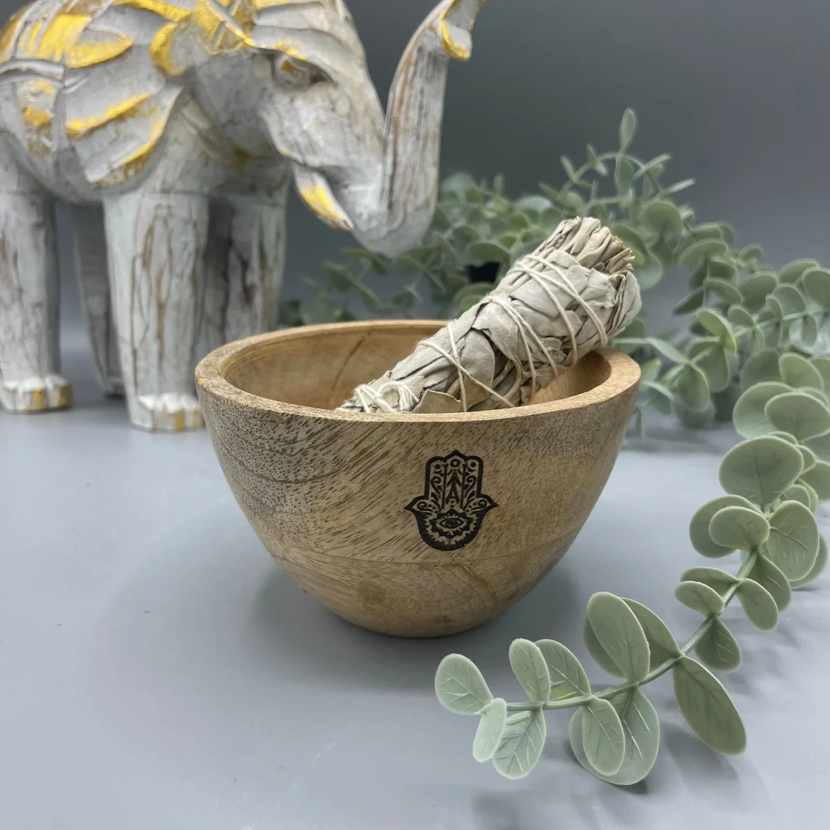 Wooden hamsa ritual bowl measuring 11x7cm, designed for smudge and ritual offerings, smooth natural finish