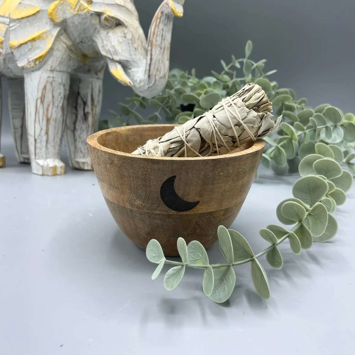 Wooden ritual offerings bowl with three moons design, measuring 11x7cm, shown on a plain background