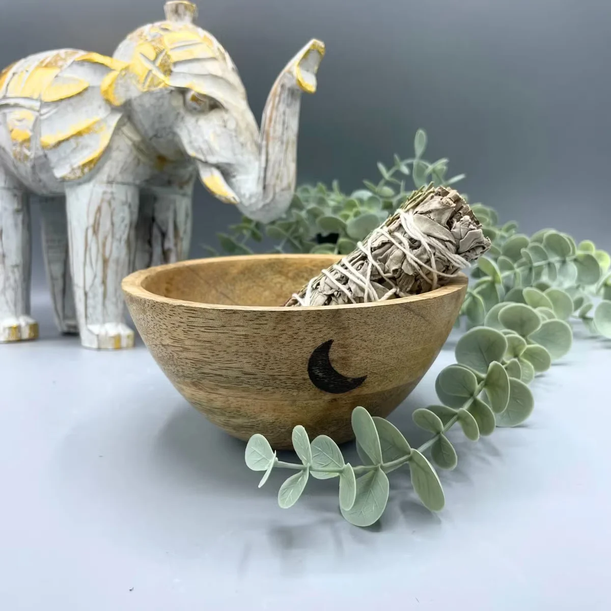 Wooden three moons bowl measuring 13x7cm, designed for smudge and ritual offerings with moon motifs