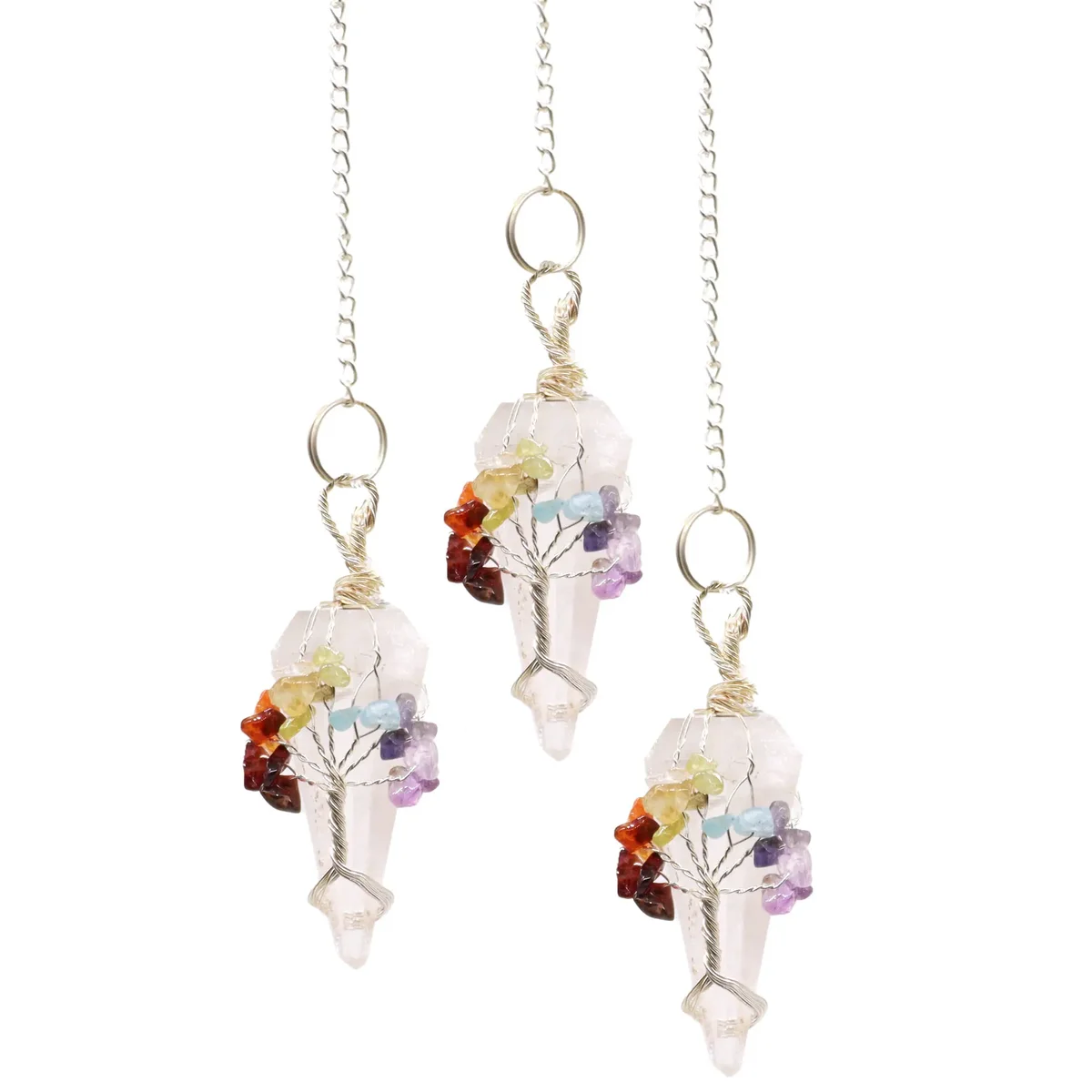 Magic pendulum quartz with seven chakra stones and rock quartz crystal on a silver chain against white background