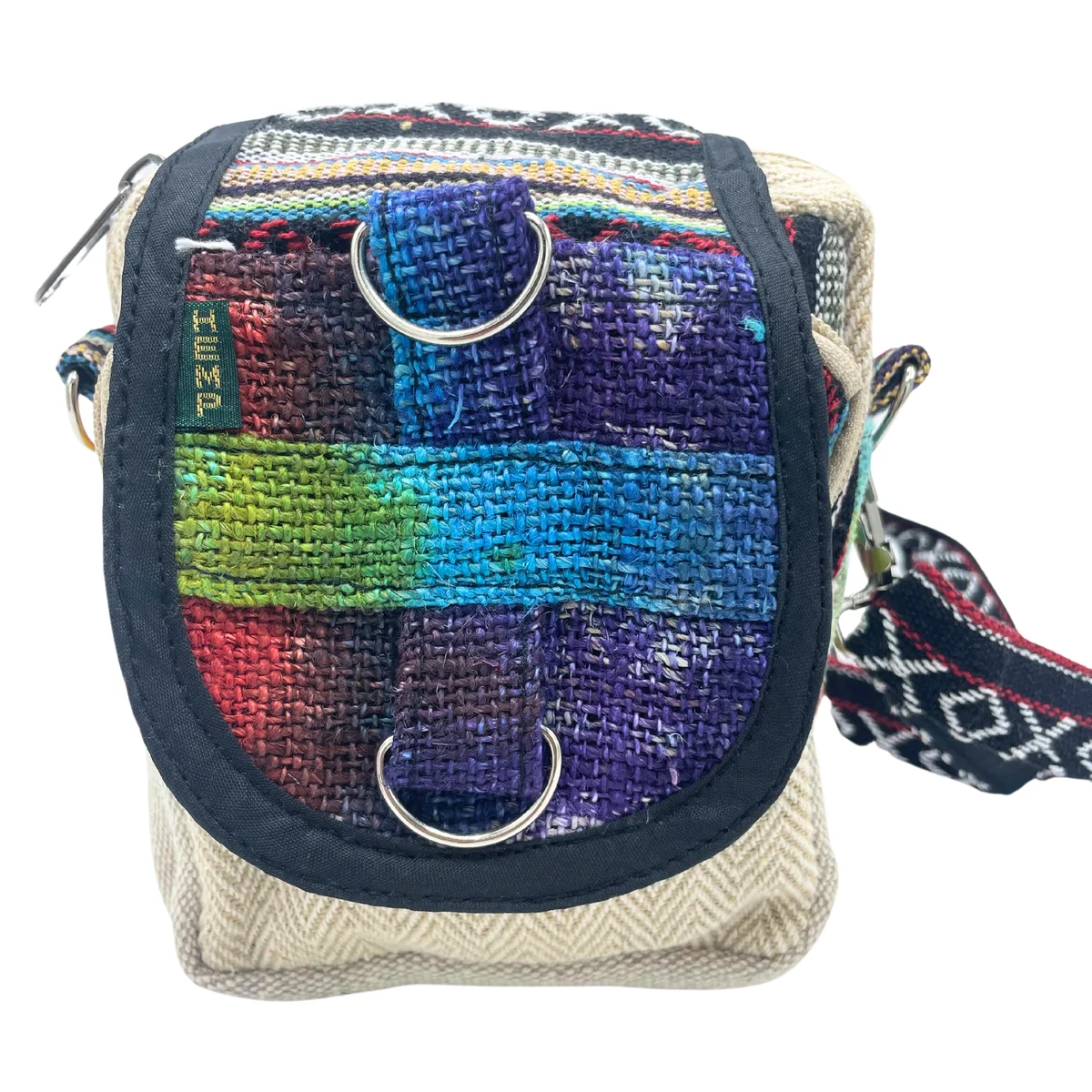 Tiedye hemp eco friendly messenger bag shown from side with adjustable shoulder strap and flap closure