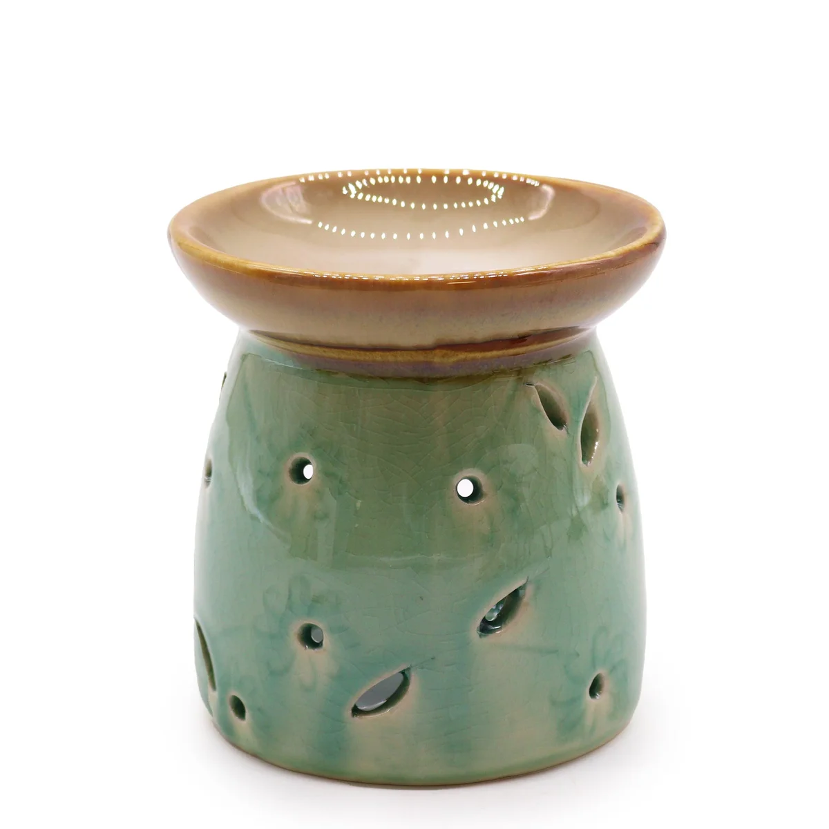 Blue ceramic oil burner with classic design shown from side angle on white background