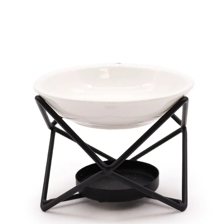 Ceramic metal stand with hexagonal design, metal base and ceramic top.