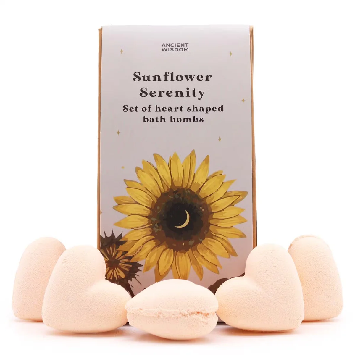 Sunflower bath bomb shaped like a heart in the Sunflower Serenity Bath Heart Gift Set packaging