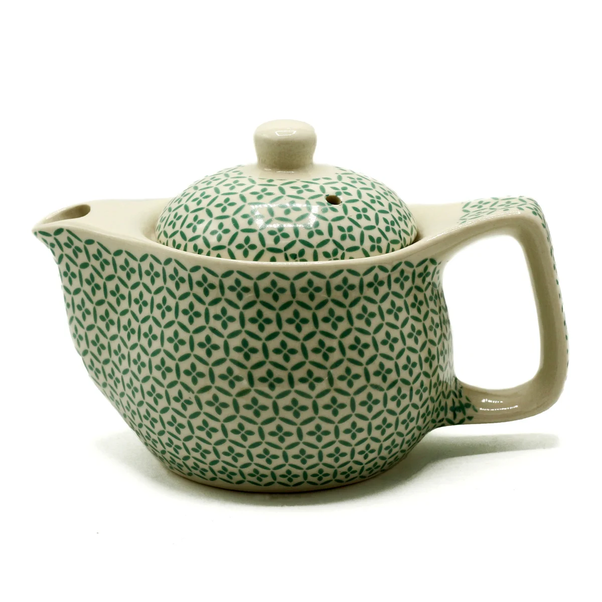 Small green mosaic teapot, suitable for brewing herbal blends.