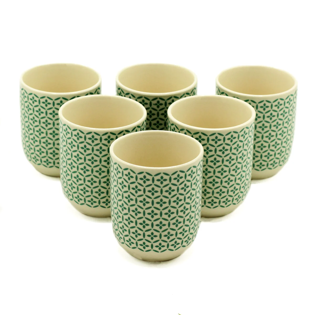 Green mosaic ceramic tea mugs displayed on a neutral background.