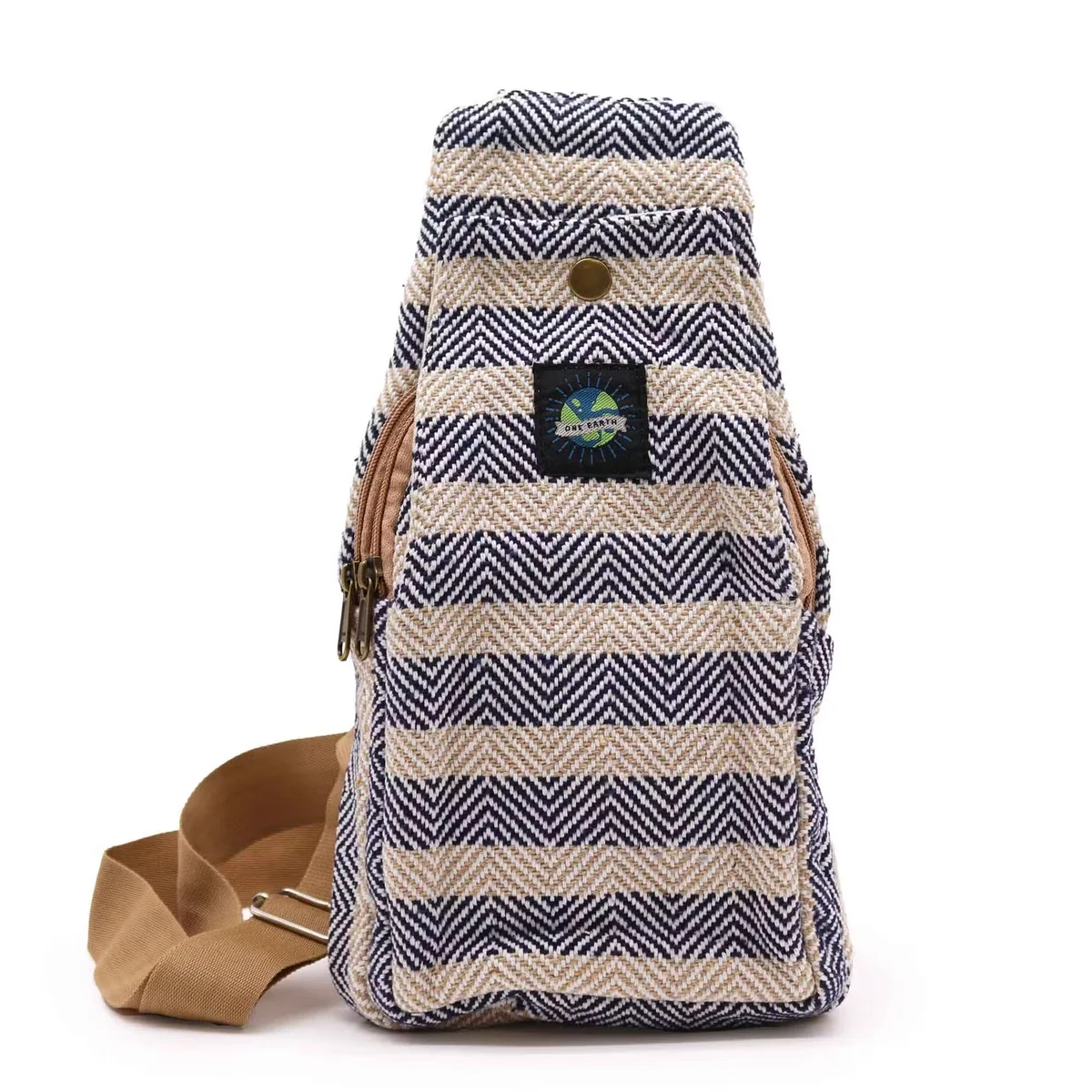 Tan and navy crossbody bag cotton with adjustable strap and front pocket, natural fabric texture visible
