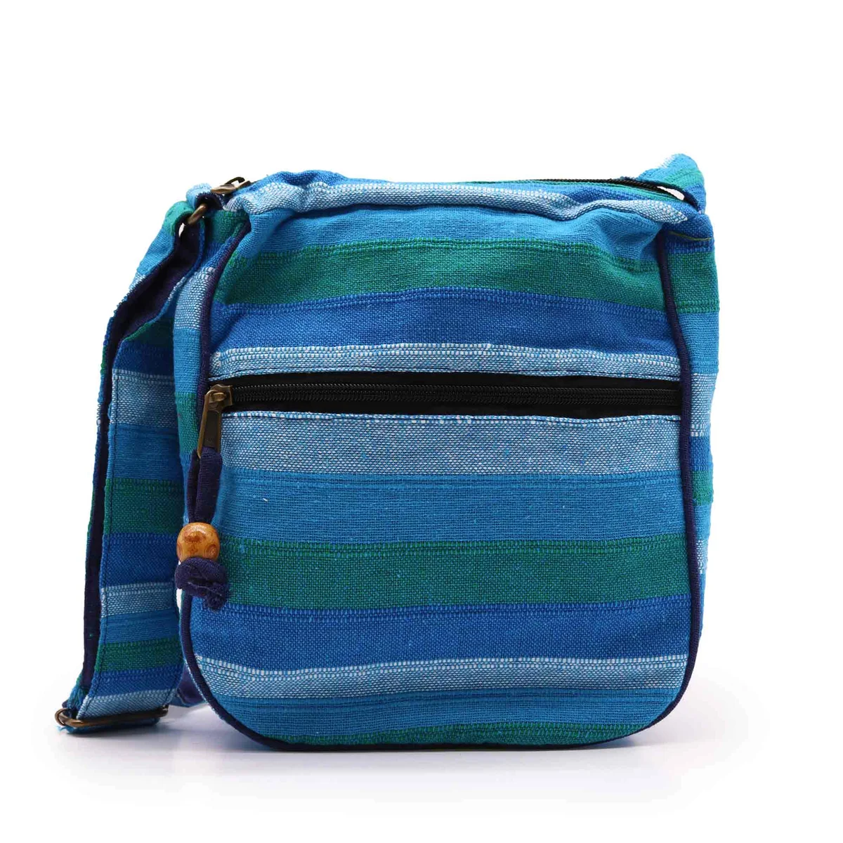 Blue sling bag with adjustable strap resting on shoulder.