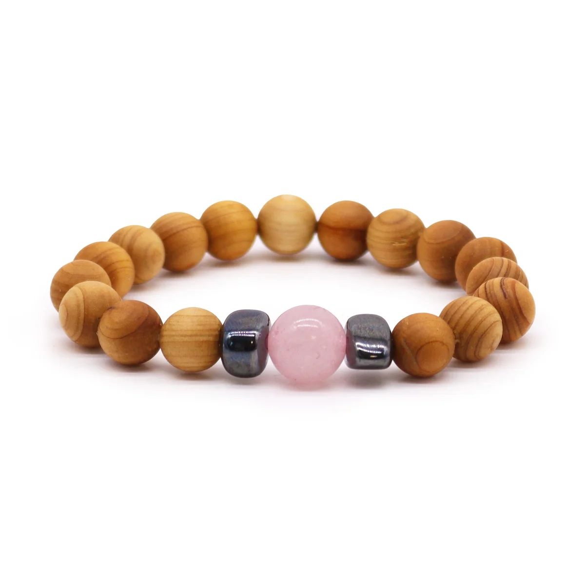 Cedarwood heart chakra bangle featuring a rose quartz stone – a rose quartz bracelet with a wooden heart shape