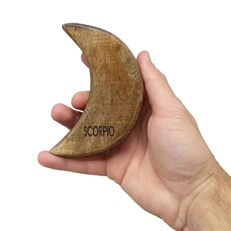 Brass zodiac sign incense burner engraved with a moon symbol, handheld incense holder.