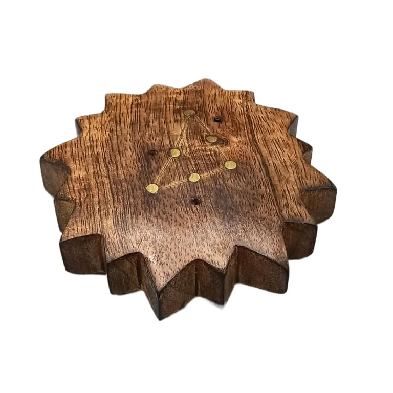 Brass zodiac sign incense holder featuring an engraved sun symbol, classic incense burner