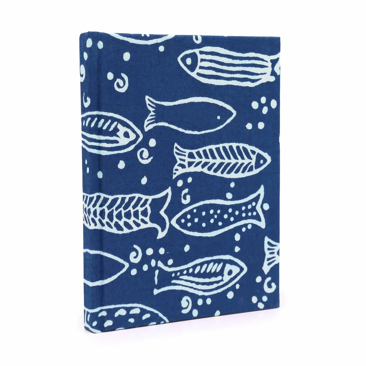 Cotton bound notebooks with indigo fish print, 20x15cm notebooks stacked on a table.