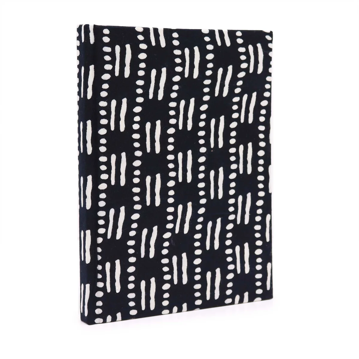 Black cotton bound 20x15cm notebook with black dots & dashes, 96 pages notebooks, opened to reveal lined pages.