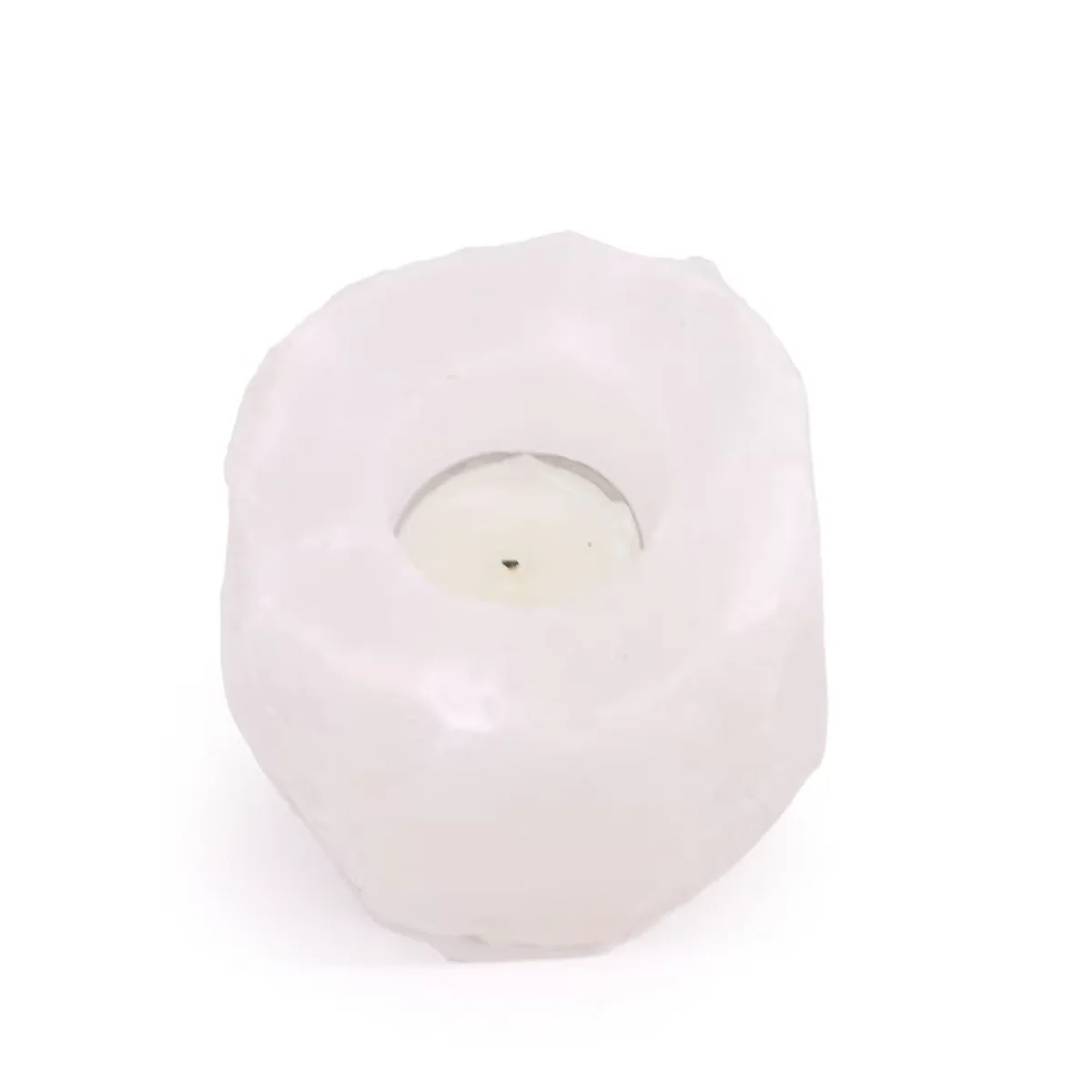 Decorative candle holder made from pink Himalayan salt crystal weighing 600-800g with rough textured surface