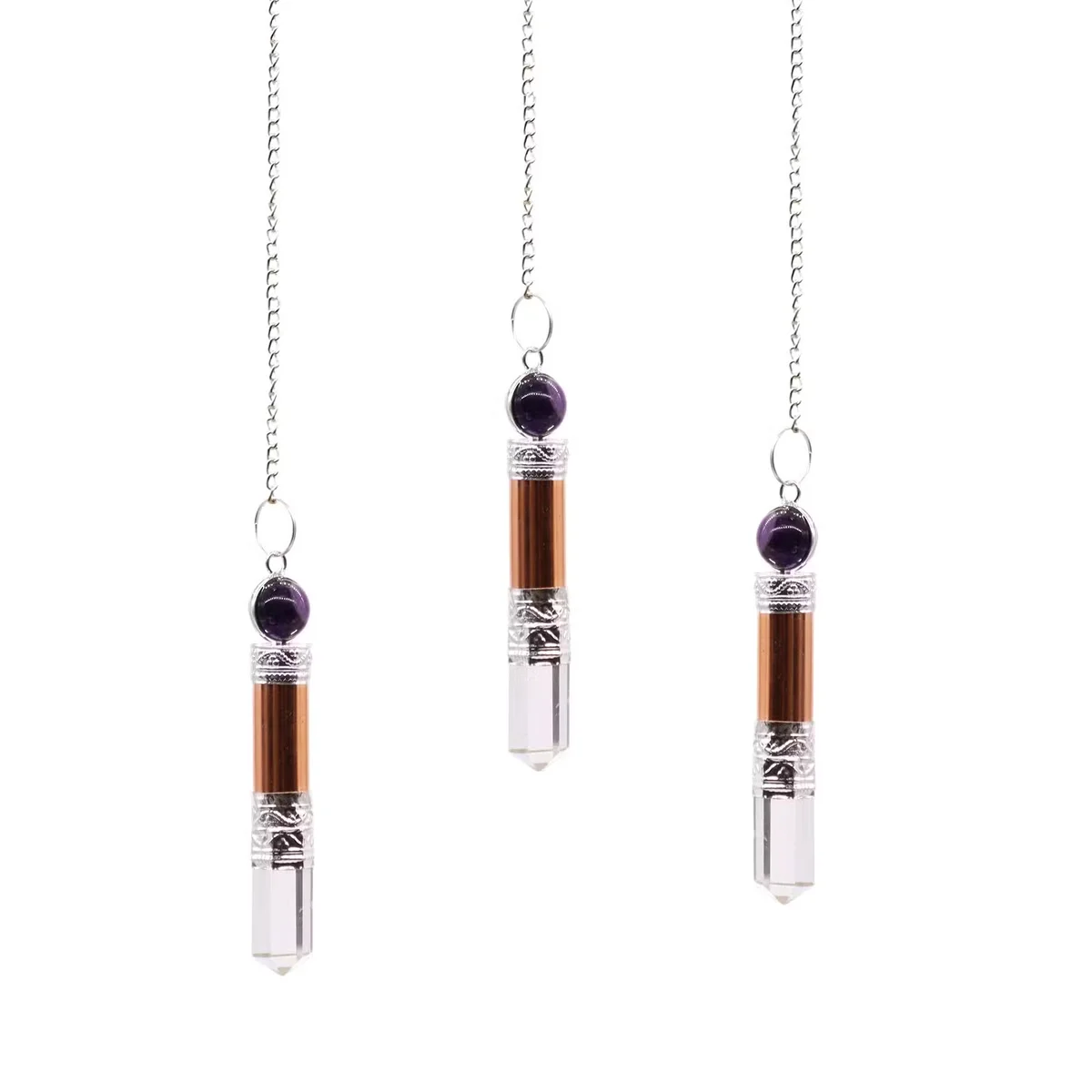 Copper base holding a natural stone ornament featuring amethyst and quartz crystals in purple and clear hues