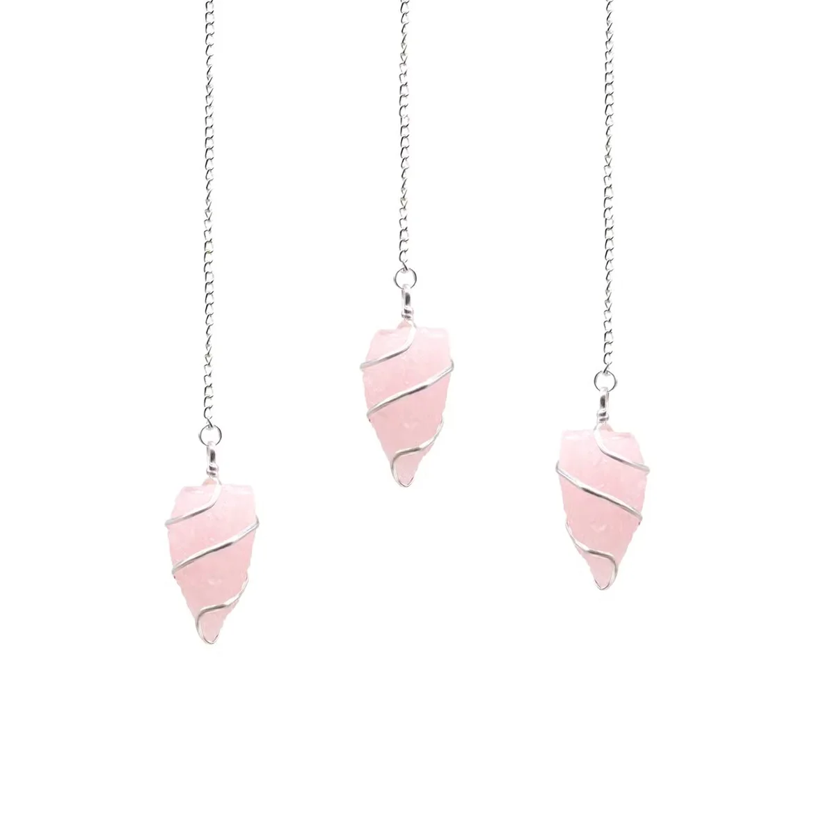 Raw rose quartz natural crystal pendulum with a pointed gemstone and metal chain on a white background