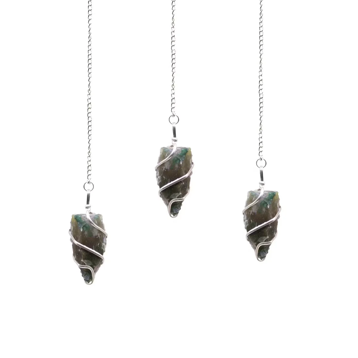 Raw Moss Agate natural stone pendulum with green and white patterns, polished point and silver chain on white background