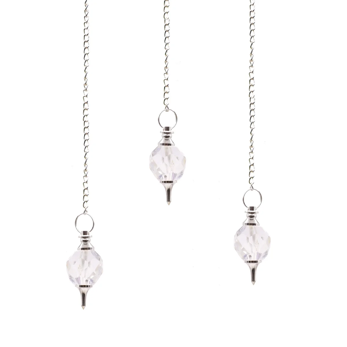 Faceted rock quartz pendulum hanging from a delicate quartz crystal necklace chain on white background