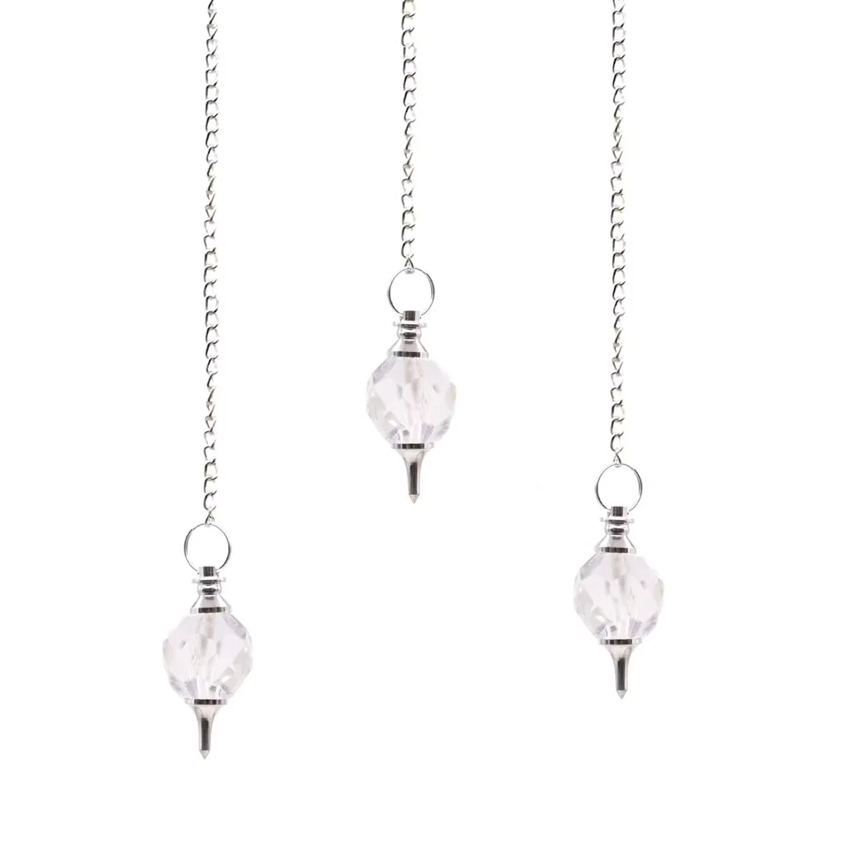 Faceted rock quartz healing crystal pendulum with silver chain on white background, showing clear gemstone details