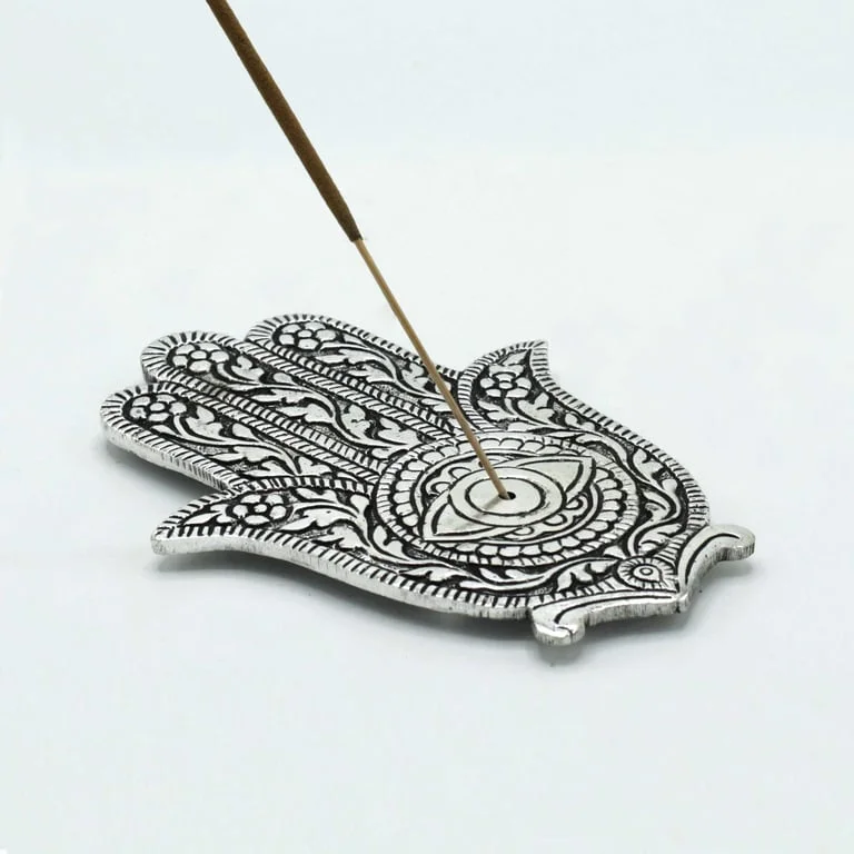 Polished aluminium hamsa incense holder, 14 cm tall, shown in a hand‑shaped design.