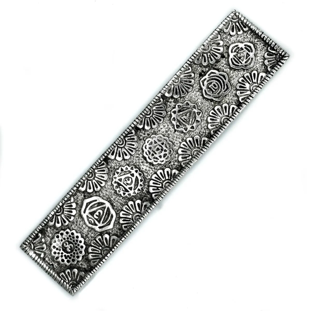 Polished aluminium long incense holder 23cm featuring chakra design on a white background