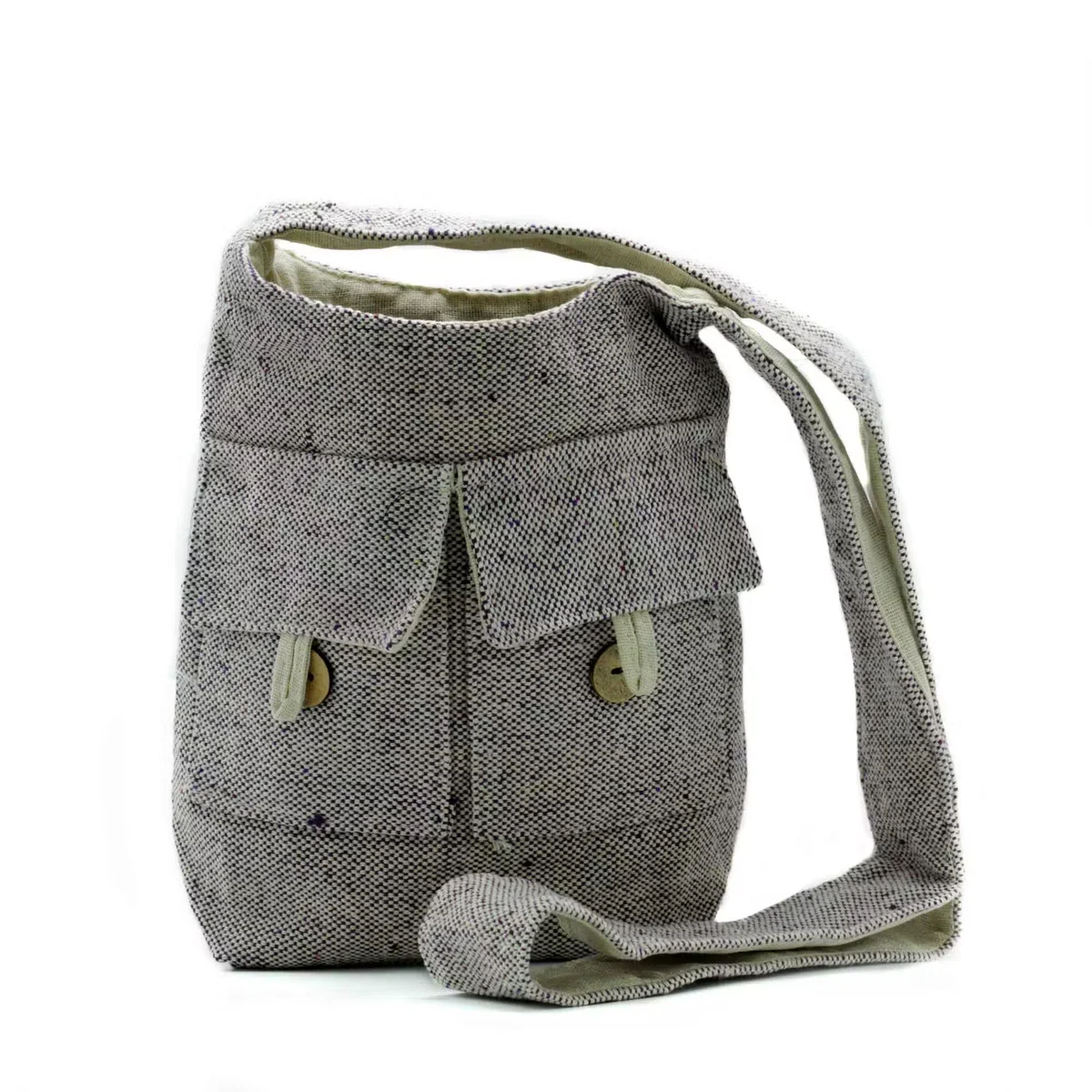 Medium soft lavender natural tones bag with two pockets, made from smooth fabric, shown against a plain background