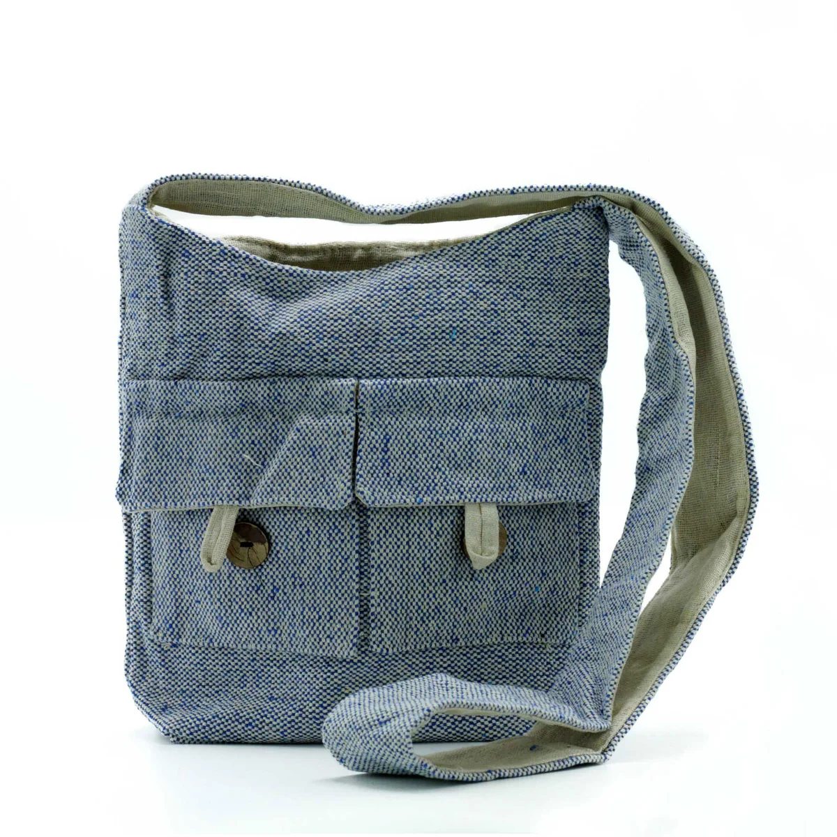 Medium natural tones two pocket bag in comp denim fabric with two front pockets and adjustable strap
