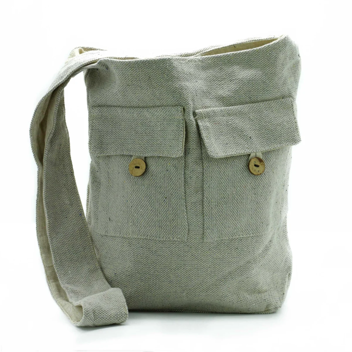 Large stone colour handbag with two pockets in natural tones, shown from the side against a white background