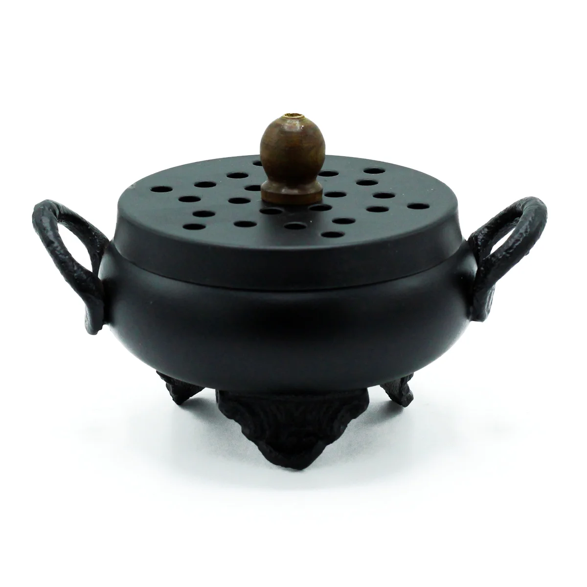 Classic iron cauldron burner on a counter, reflecting its simple, sturdy steel design.