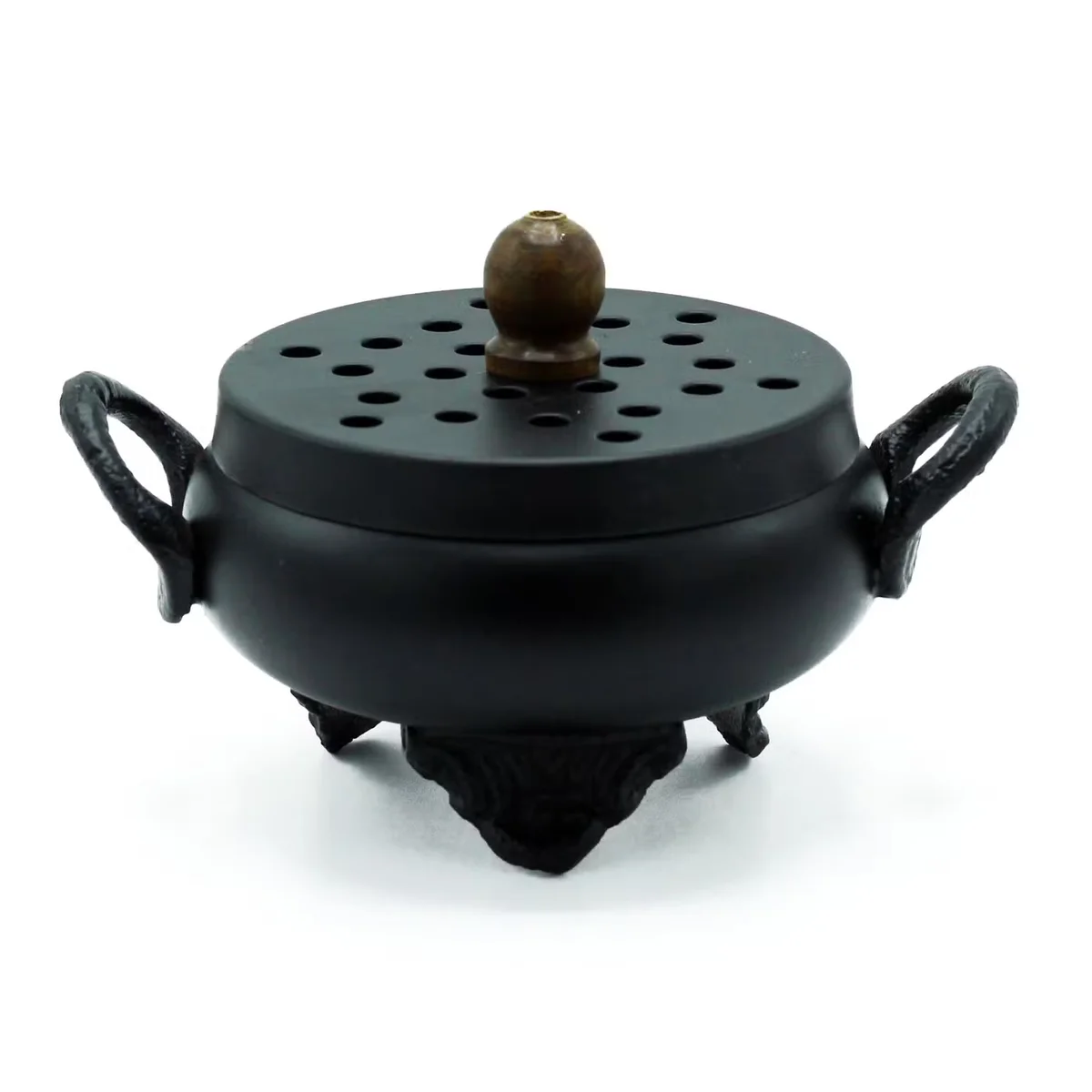Classic iron cauldron burner displayed in product photo.