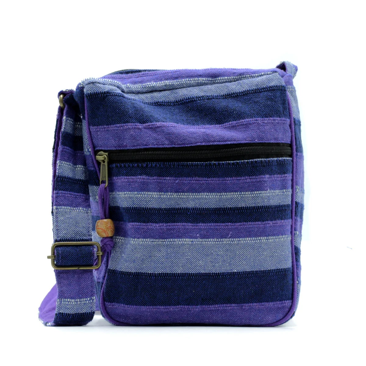 Large Nepal sling bag in deep sea blue with adjustable strap shown against white background
