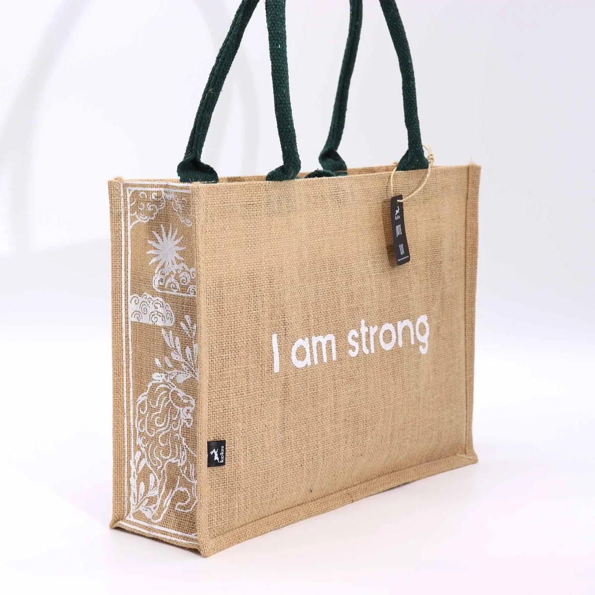 Large jute bag with "I am Strong" text and Hop Hare branding, designed for durable everyday use