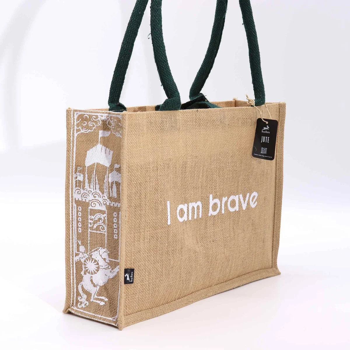 Hop Hare jute tote bag in natural color with "I am Brave" text printed on front