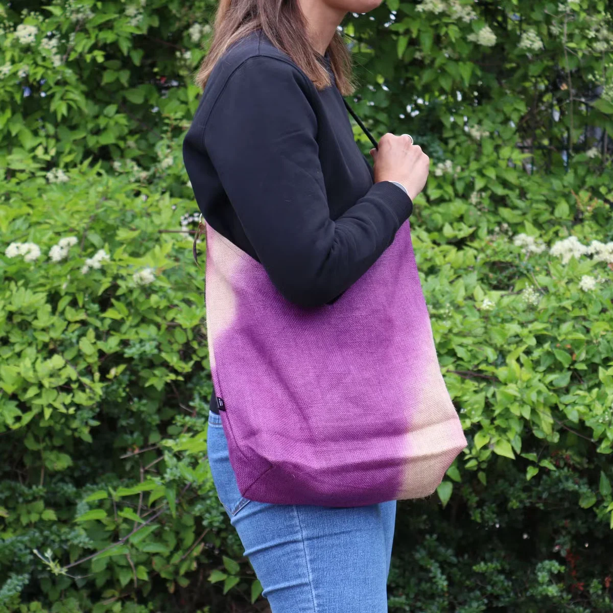 Antique fuchsia soft blend lightweight tote bag shown from side angle with shoulder straps on white background