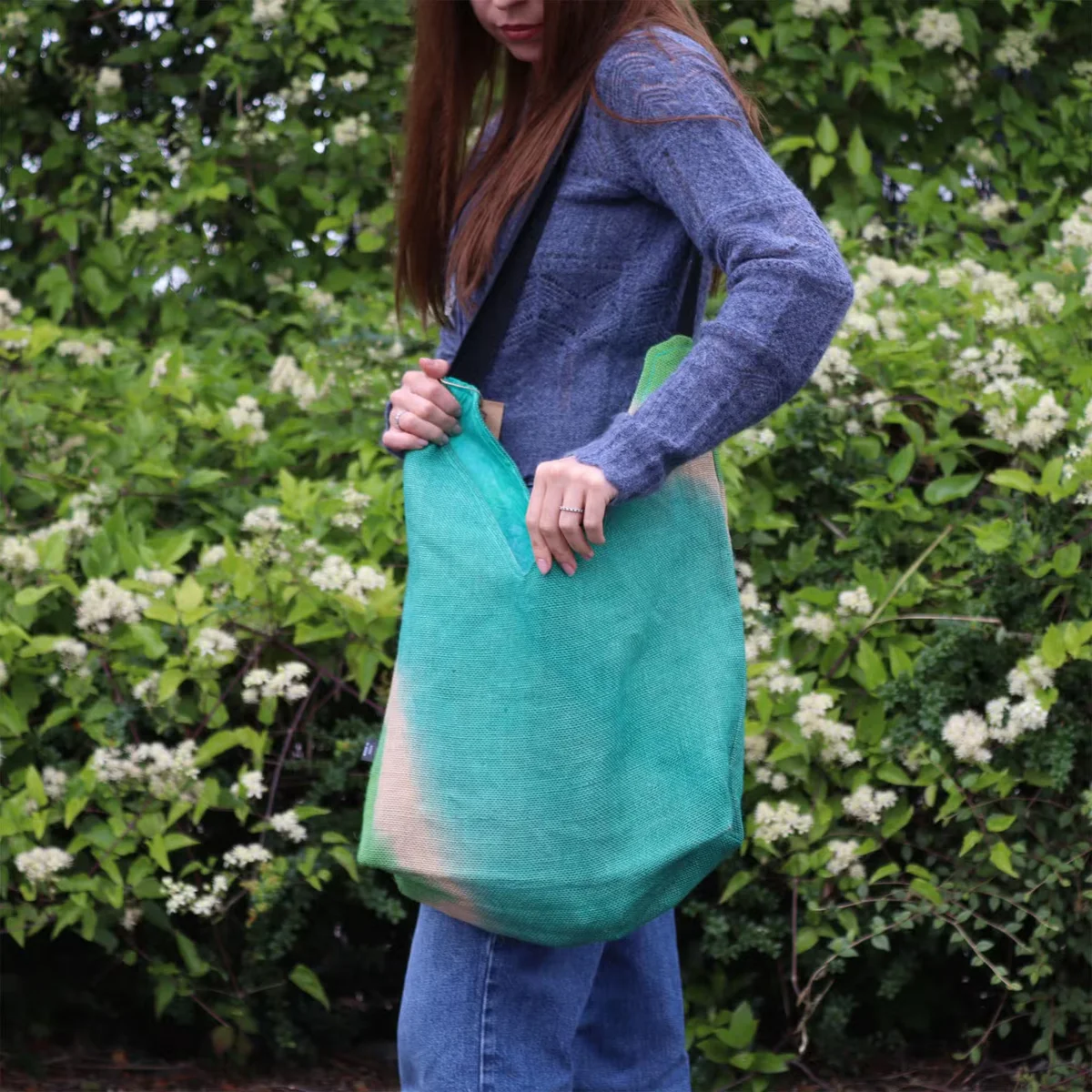 Soft blend teal tote bag with shoulder straps displayed on a plain white background, showing front and side views