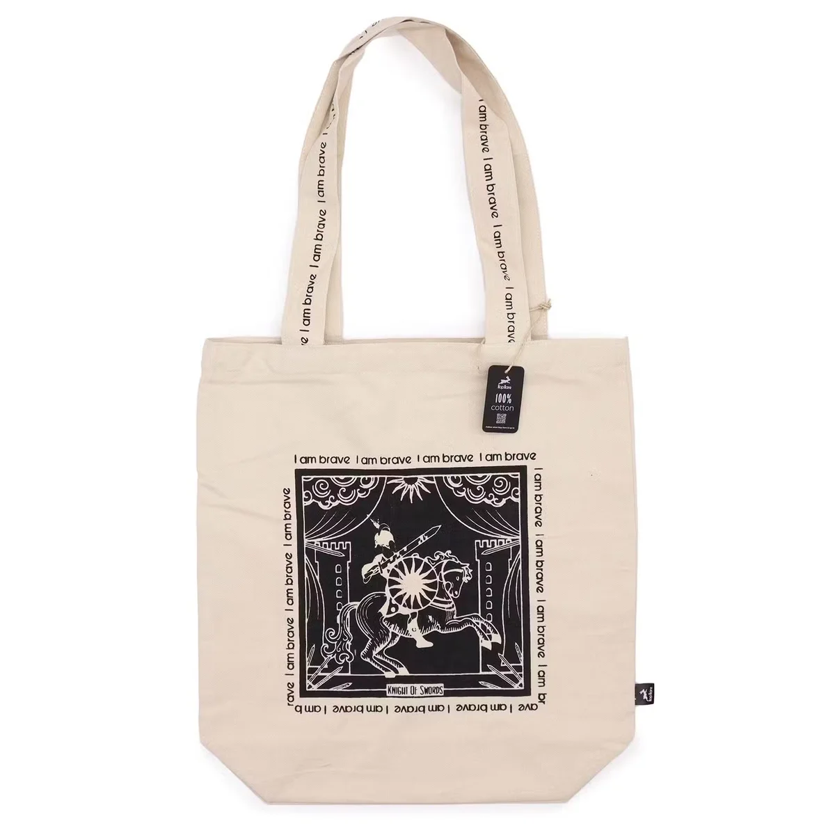 Canvas tote bag with "I am Brave" text and hop hare design on natural fabric background, shown flat on white surface