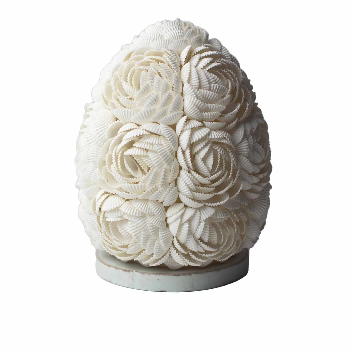 Rose oval boho sea shell 15cm decorative lamp with soft pink tones on white background, side view