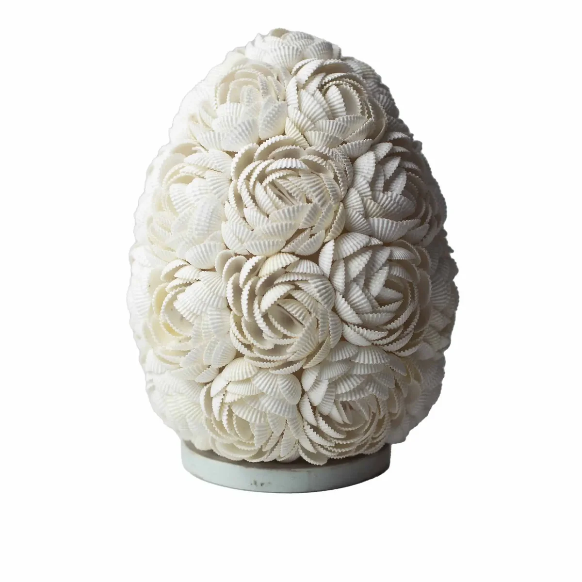 Boho sea shell rose oval lamp in soft pink with 20cm height on a white background