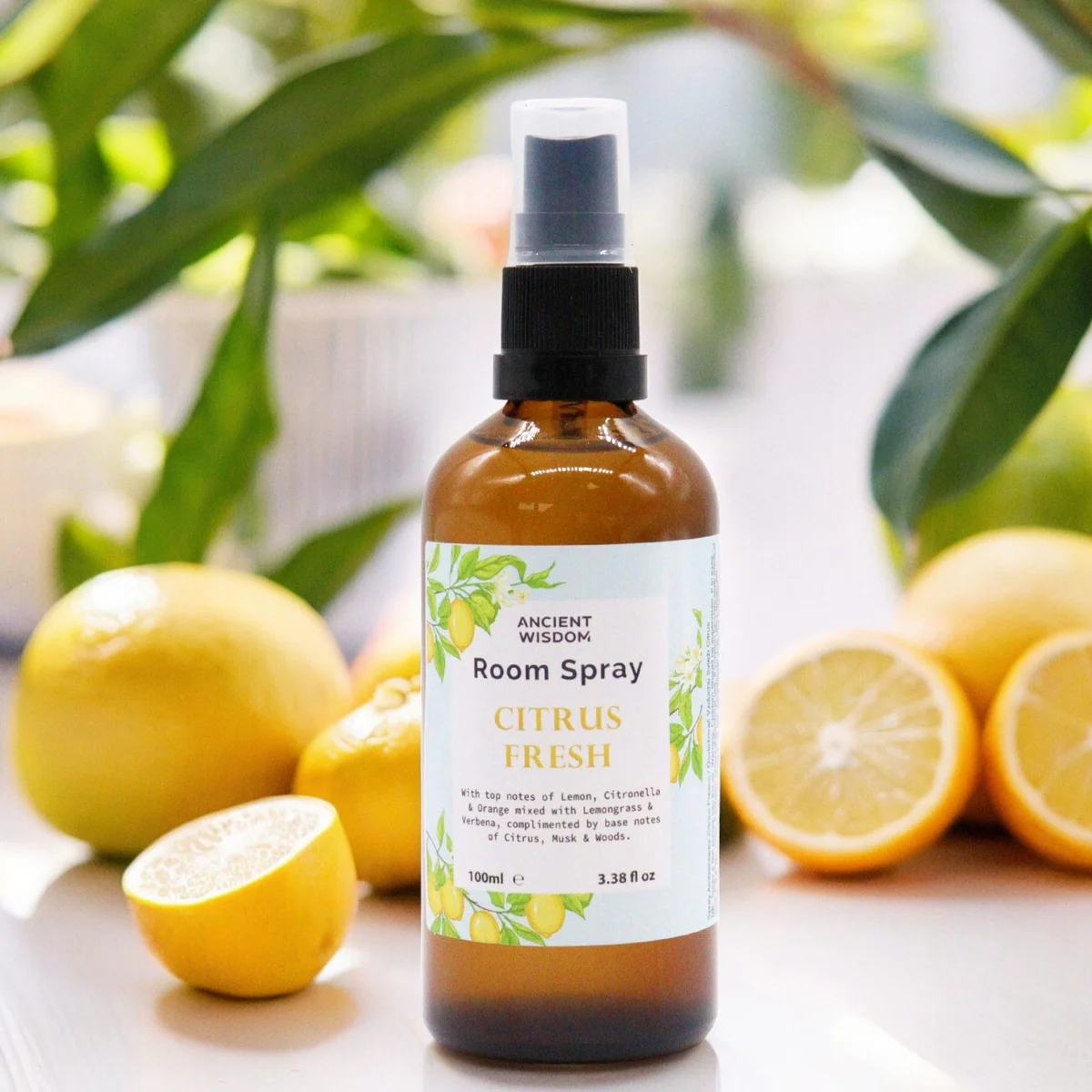 100ml bottle of Home Fresh Citrus Room Spray with fresh citrus label on a white background