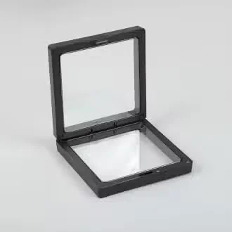 7x7cm frame in black, 3D floating design, minimalistic display.