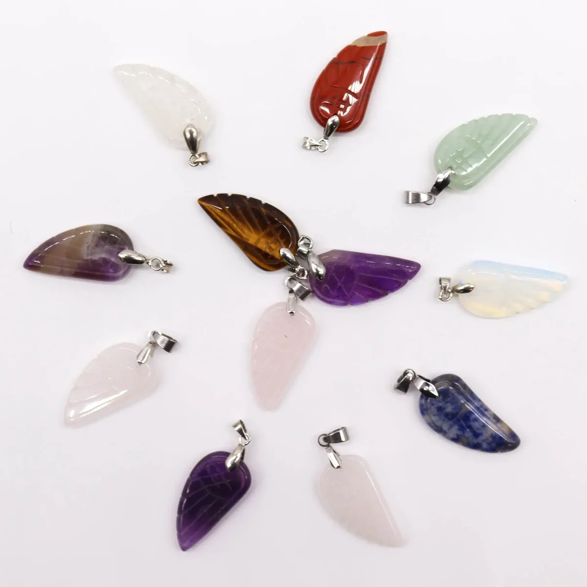 12 assorted gemstone angel wings pendants, 28x15mm, displayed close‑up.