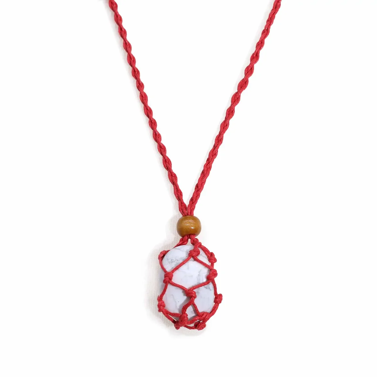 Red gemstone necklace cord displayed on a white background, suitable for jewelry making and crafting projects