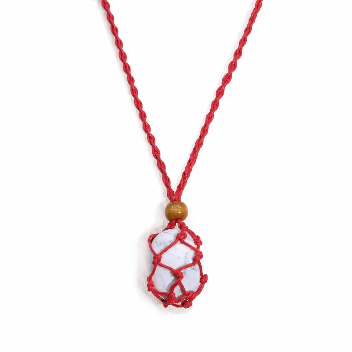 Red gemstone necklace cord displayed coiled, suitable as necklace cord for gemstones crafting and jewelry making.