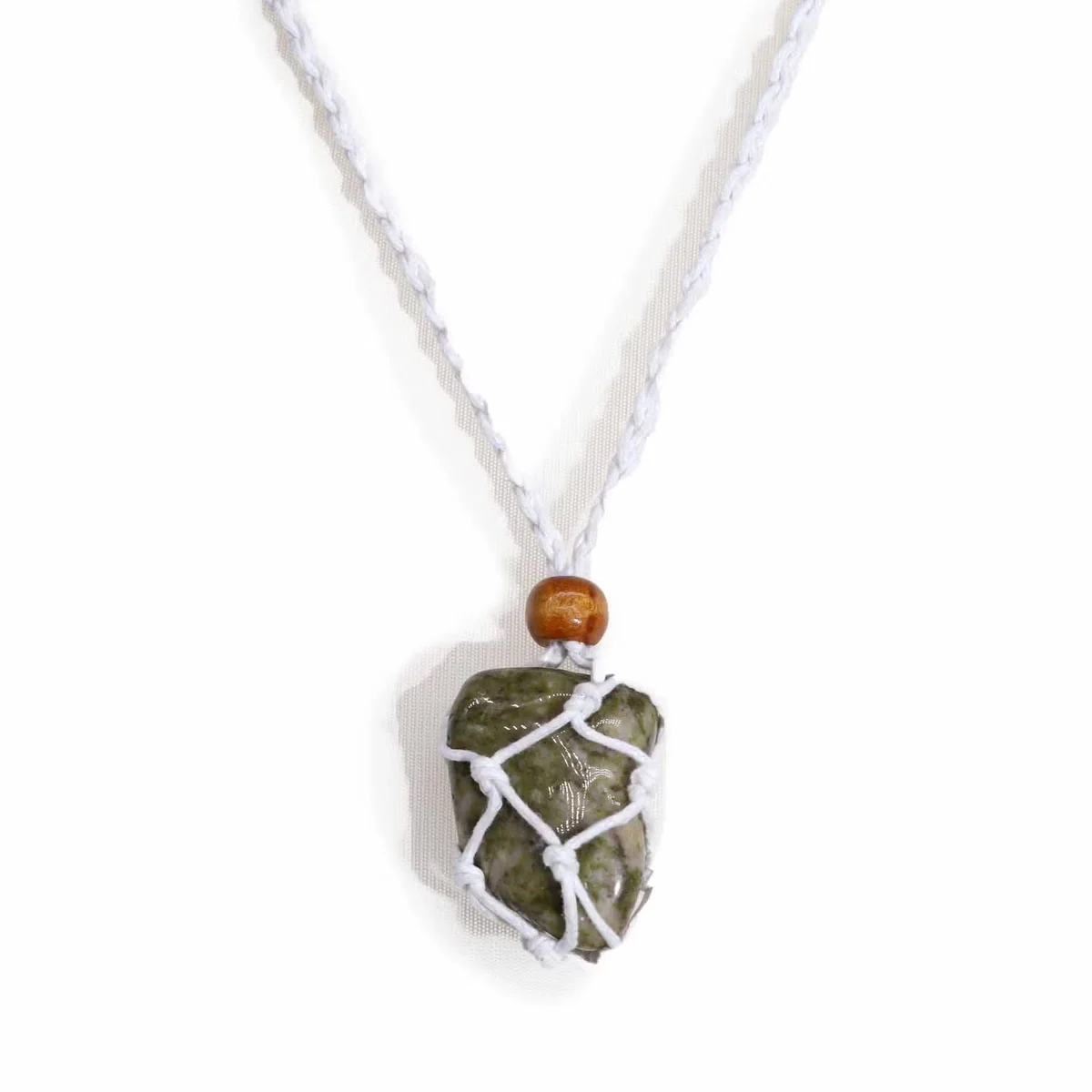 White gemstone necklace cord displayed coiled, suitable as necklace cord for gemstones accessories and crafting.